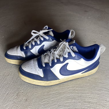 Navy and white Nike Dunk Low trainers 
