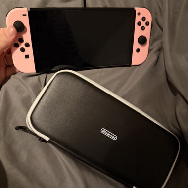 Nintendo Switch with pink Joy-Cons & Case