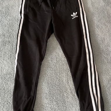  black Adidas jogging pants