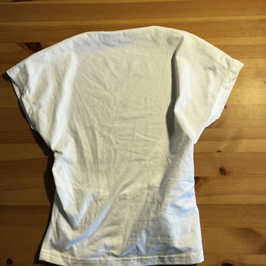 Haut blanc dos nu