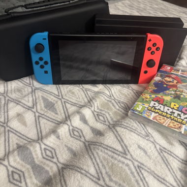 Nintendo Switch avec accessoires et jeu