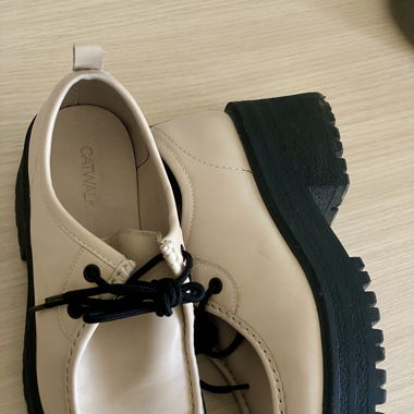 Beige platforms lace-ups