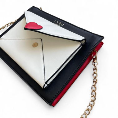 Schultertasche schwarz, weiss und rot