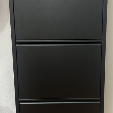 2 black shoe cabinets
