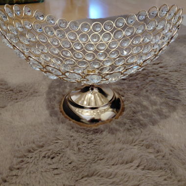 Decorative bowl with crystal stones on base