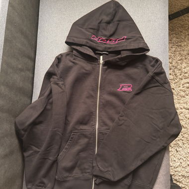Felpa nera con zip