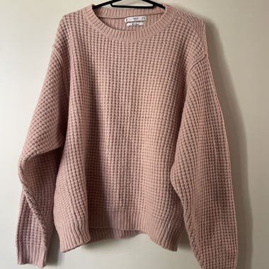 Pull en maille rose 