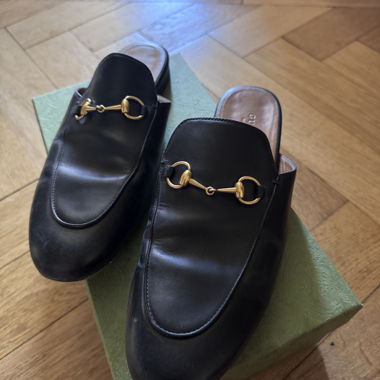 Black leather horsebit mules
