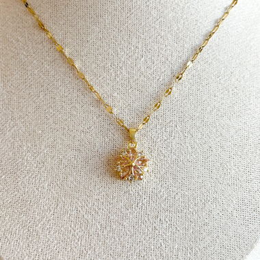 Gold necklace with zirconia flower pendant
