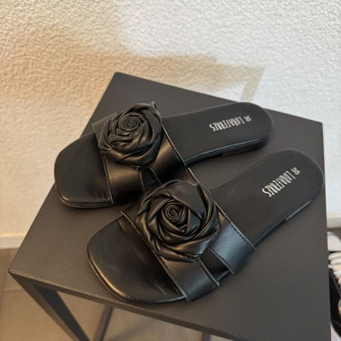 Chaussons en simili cuir