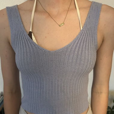 Top in maglia grigio senza maniche