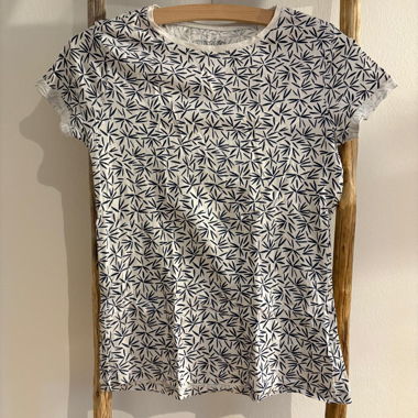 White T-shirt with blue leaves