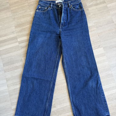 Jeans in denim a gamba larga