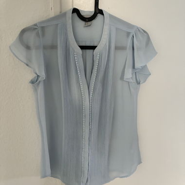 Blusa in chiffon azzurro chiaro