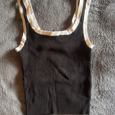 Black tank top with white straps