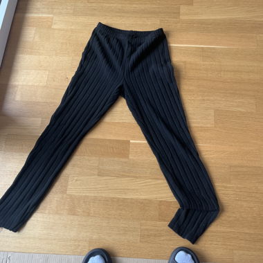 Schwarze gerippte Leggings