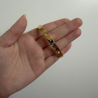Bracciale tono oro con cristalli