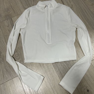 Top blanc zippé manches longues