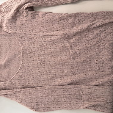 Pink knitted jumper with textured pattern
