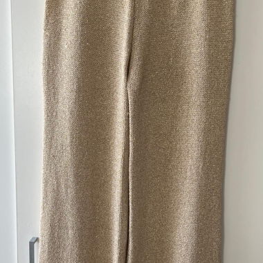 Pantaloni in maglia beige con glitter