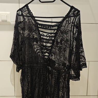 schwarzes transparentes Strandkleid