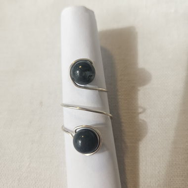 Silver ring with dark green stones