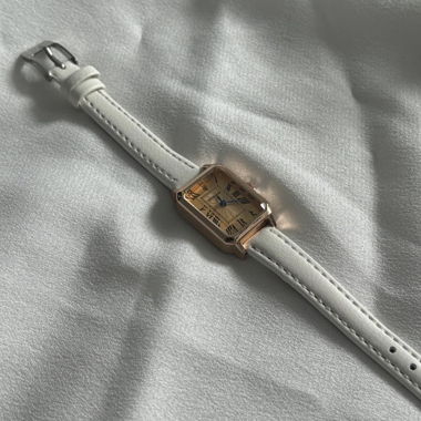 Montre Luxure en blanc et or