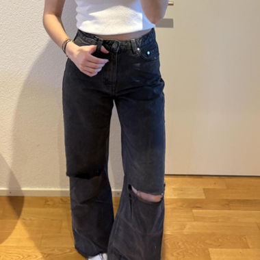 Schwarze Ripped Jeans 