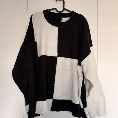 Black and white checkered sweater