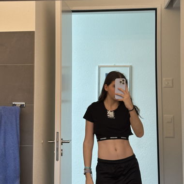 Schwarzes Crop Top "DESTINATION"