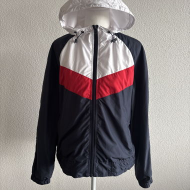 Giacca antivento tricolore con cappuccio