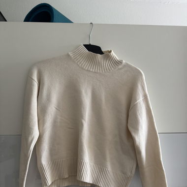 Pull col montant 
