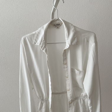 white blouse with bow detail at waist