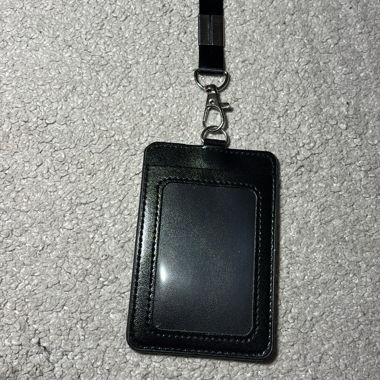 Black card holder with strap