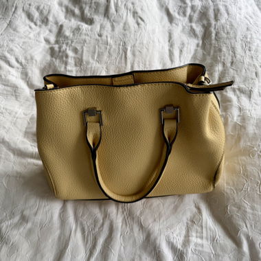 Yellow handbag with handles
