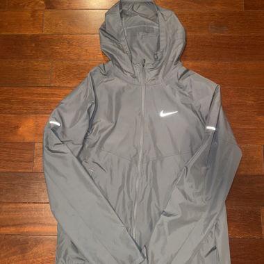 Giacca running Nike grigia