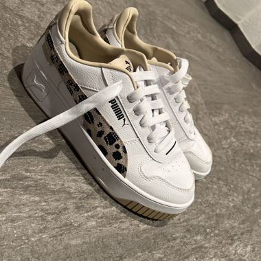 Baskets Puma blanches à motif léopard