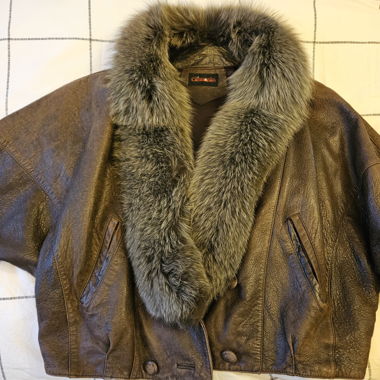 Brown leather jacket with fur collar