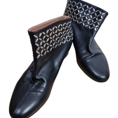 Stivaletti bassi Alaia con borchie
