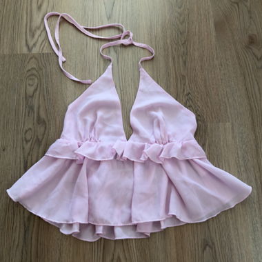 Top rosa con volant, taglia S