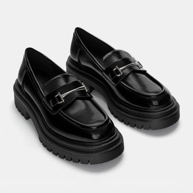 black loafers with silver detail