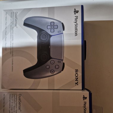 Manette PS5 argent avec chargeur