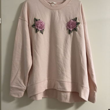 Felpa con fiori rosa