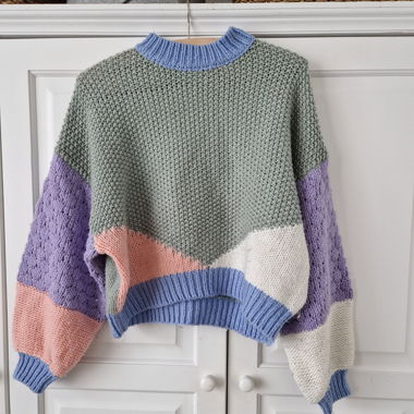 Maglione dai colori pastello
