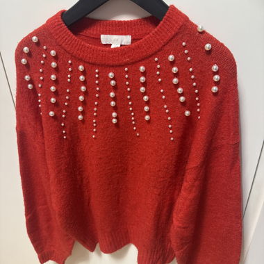 Red sweater with pearls
