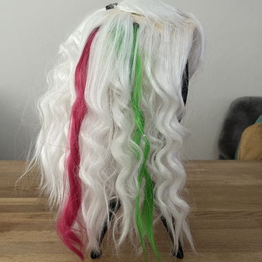 Wig with coloured streaks