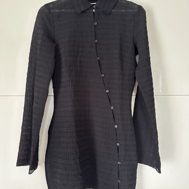 Black long-sleeve blouse by Weekday