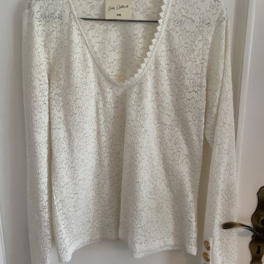 Blusa in pizzo color avorio