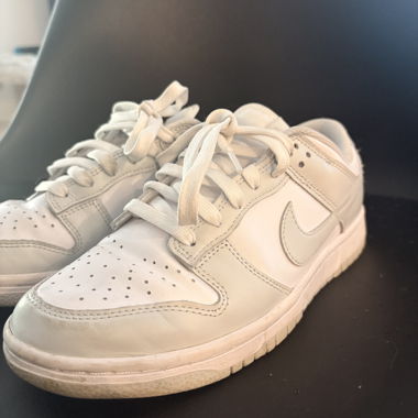 White low-top Nike sneakers