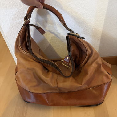 Borsa da viaggio vintage in pelle con fondo estraibile
